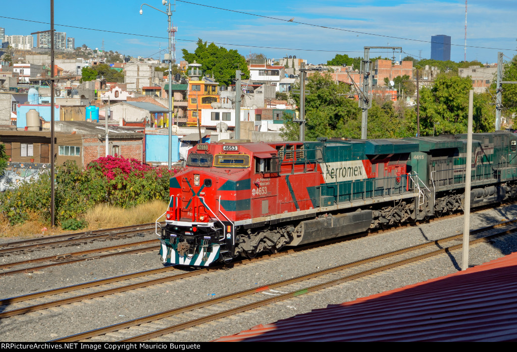 FXE ES44AC Locomotive leading a train